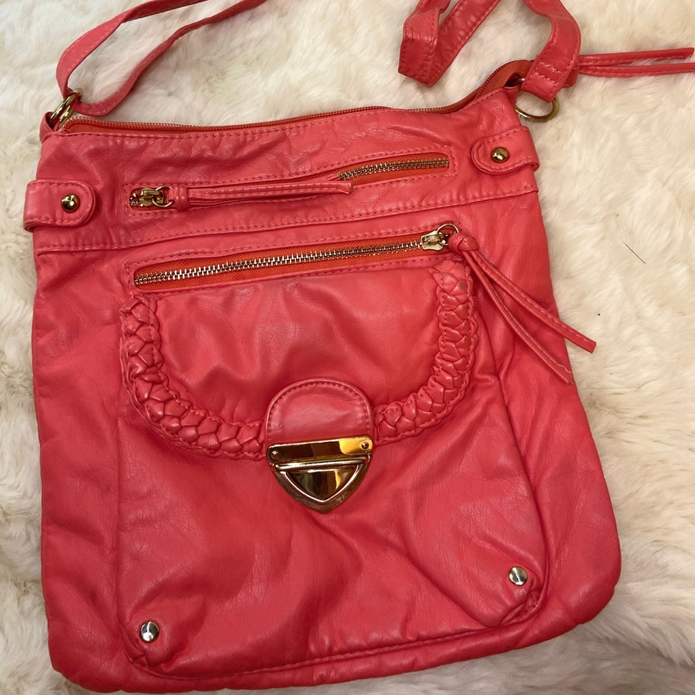 Pink crossbody bag with gold detail